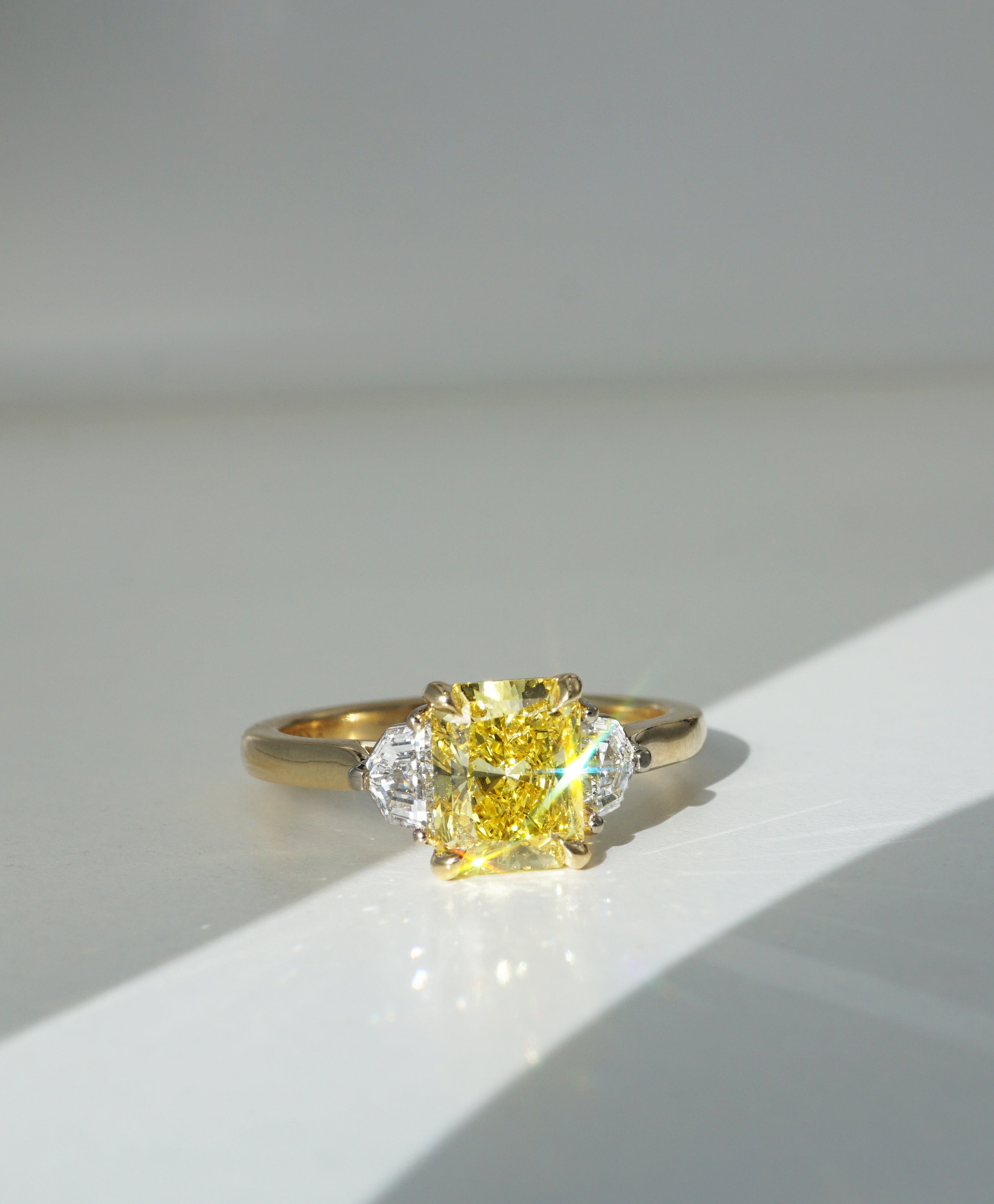 Radiant 1.59ct Yellow Diamond Trilogy Engagement Ring