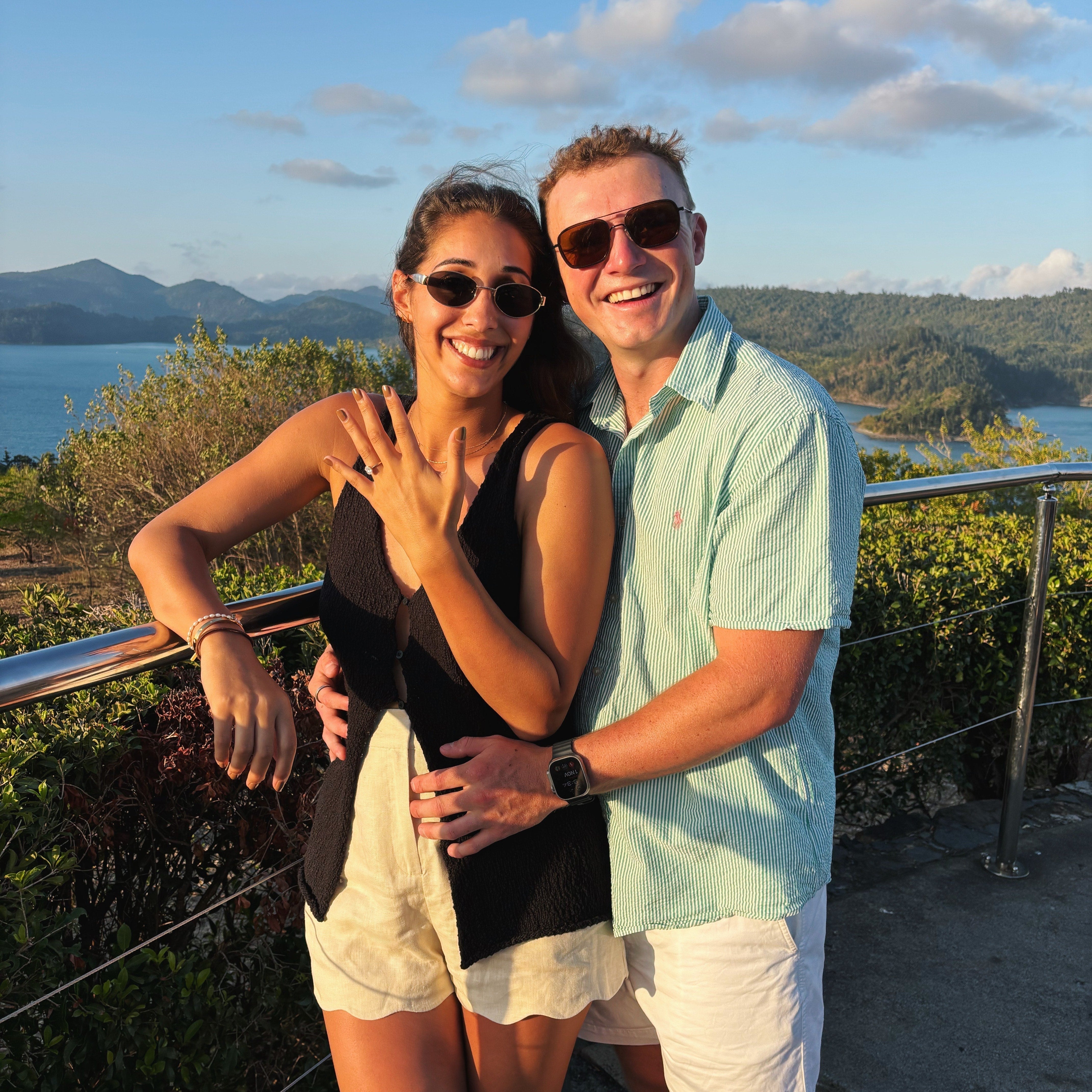Emily and Zane engagement photo at Hamilton Island One Tree Hill with 2ct Grace Oval engagement ring