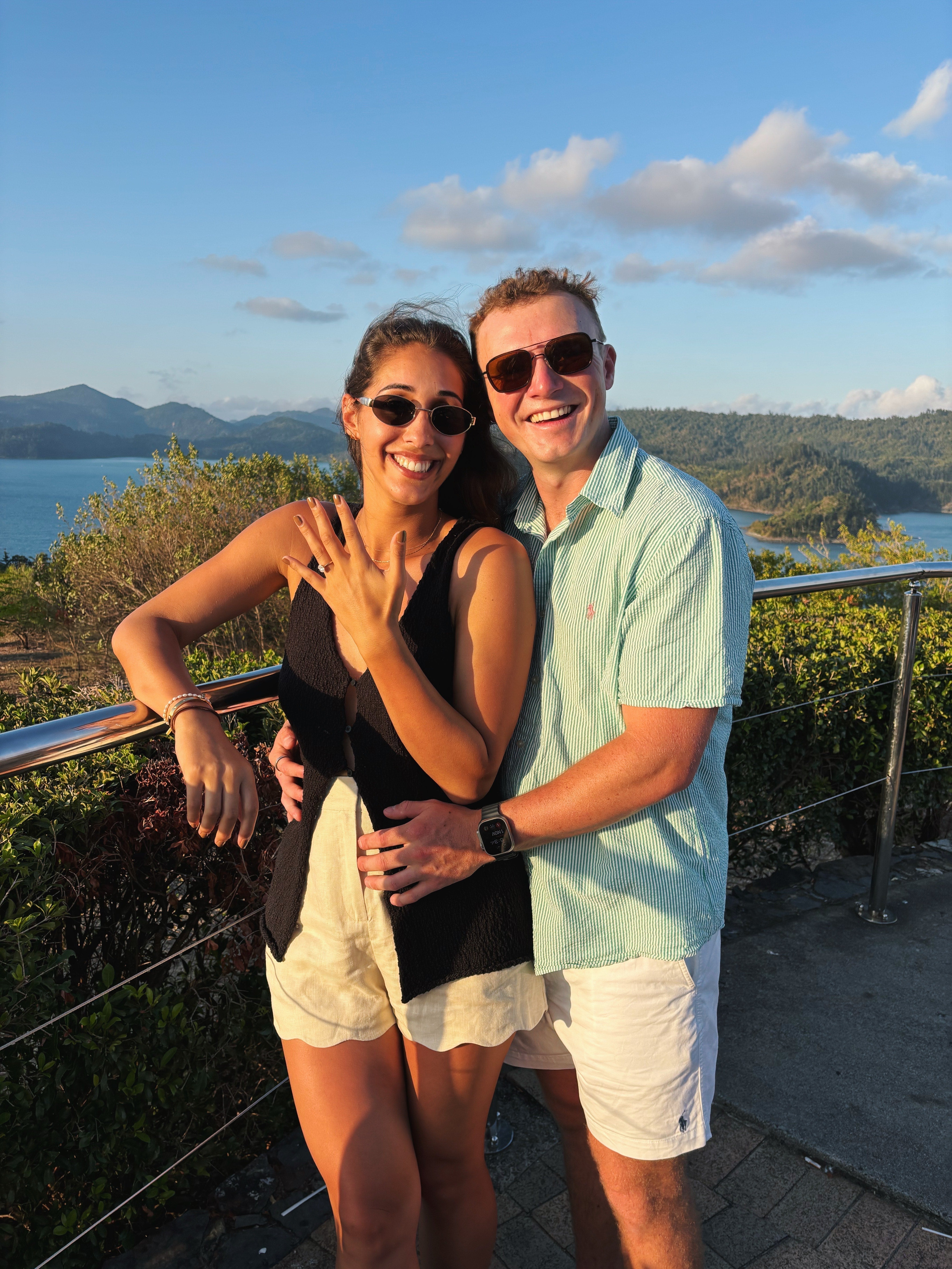 Emily and Zane engagement photo at Hamilton Island One Tree Hill with 2ct Grace Oval engagement ring