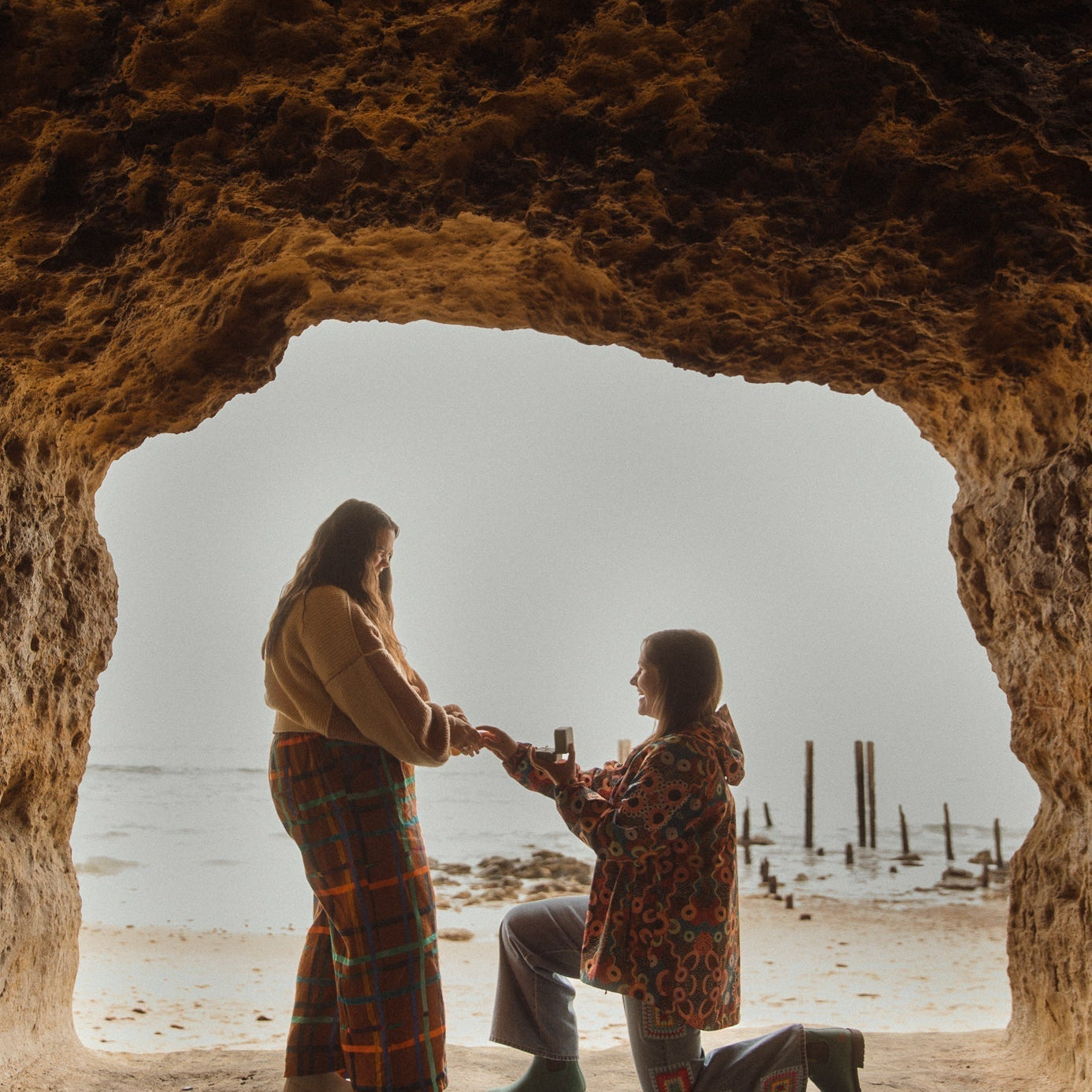 Georgia and Eliza engagement proposal at Port Willunga Beach Caves with bespoke engagement rings
