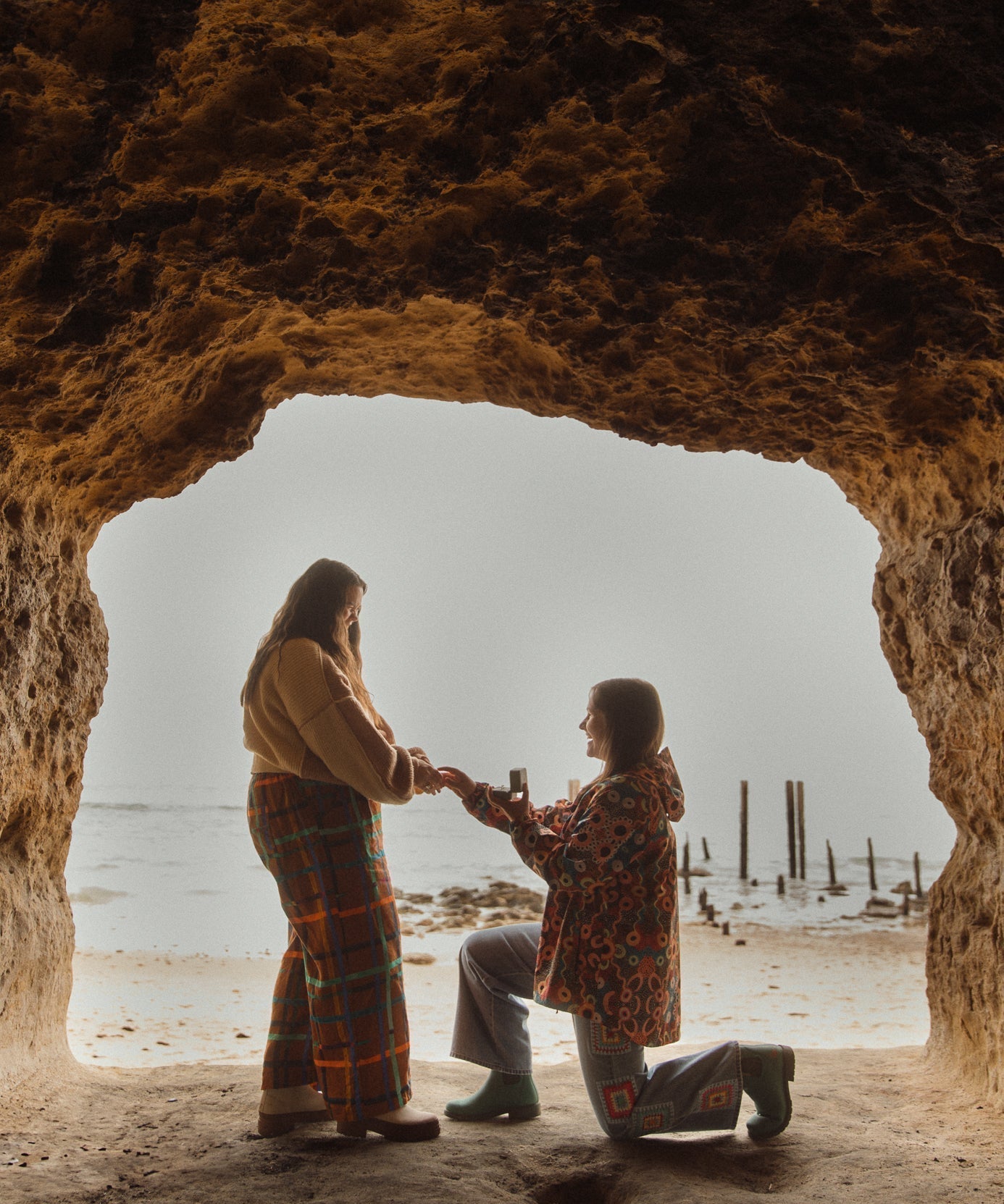 Georgia and Eliza engagement proposal at Port Willunga Beach Caves with bespoke engagement rings