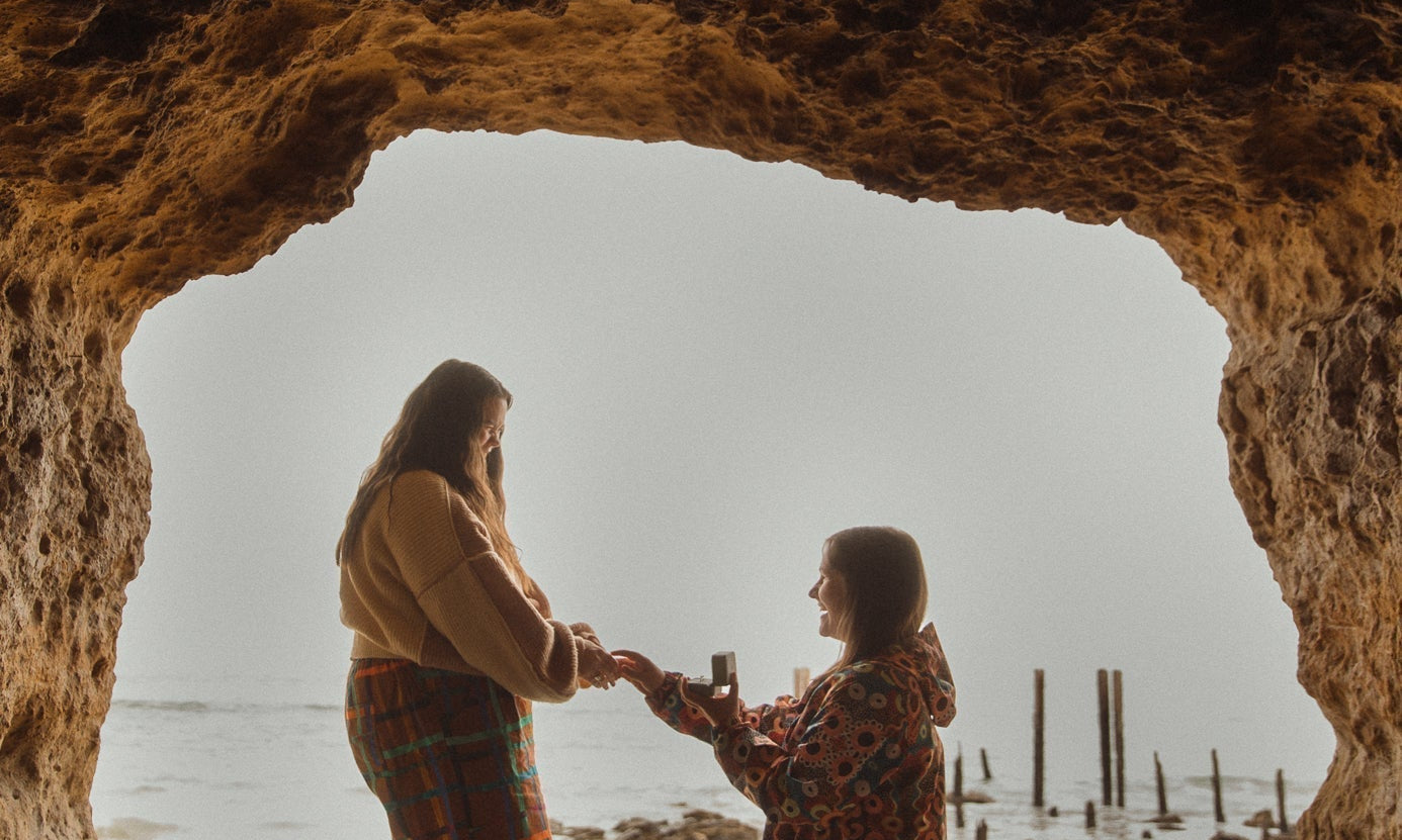 Georgia and Eliza engagement proposal at Port Willunga Beach Caves with bespoke engagement rings