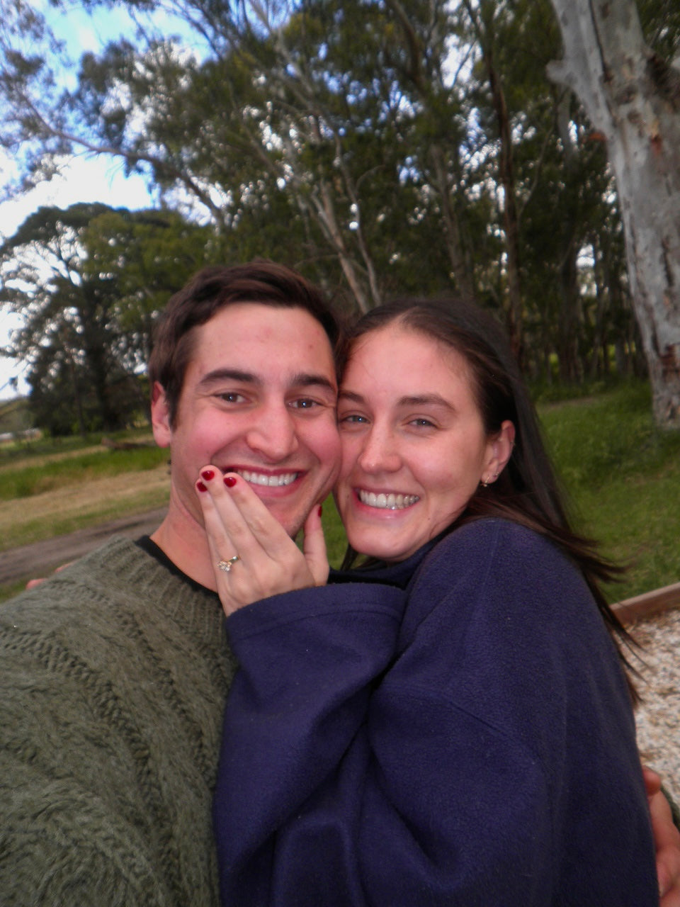 Ruby and Jacob's bespoke toi et moi engagement ring with heirloom grandmother's diamond, made by Class A Jewellers