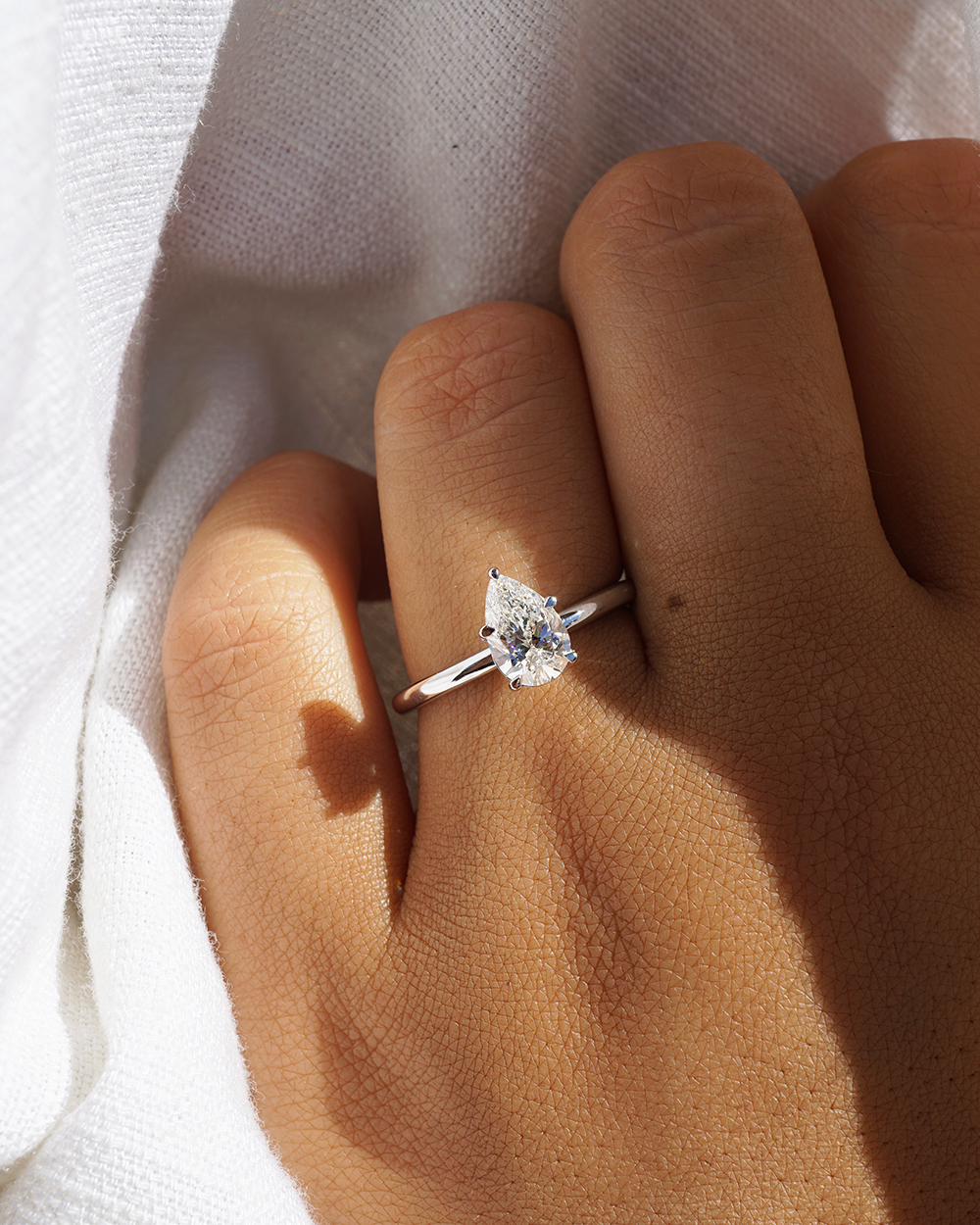 Erin | 0.82ct Pear Diamond Solitaire Engagement Rings