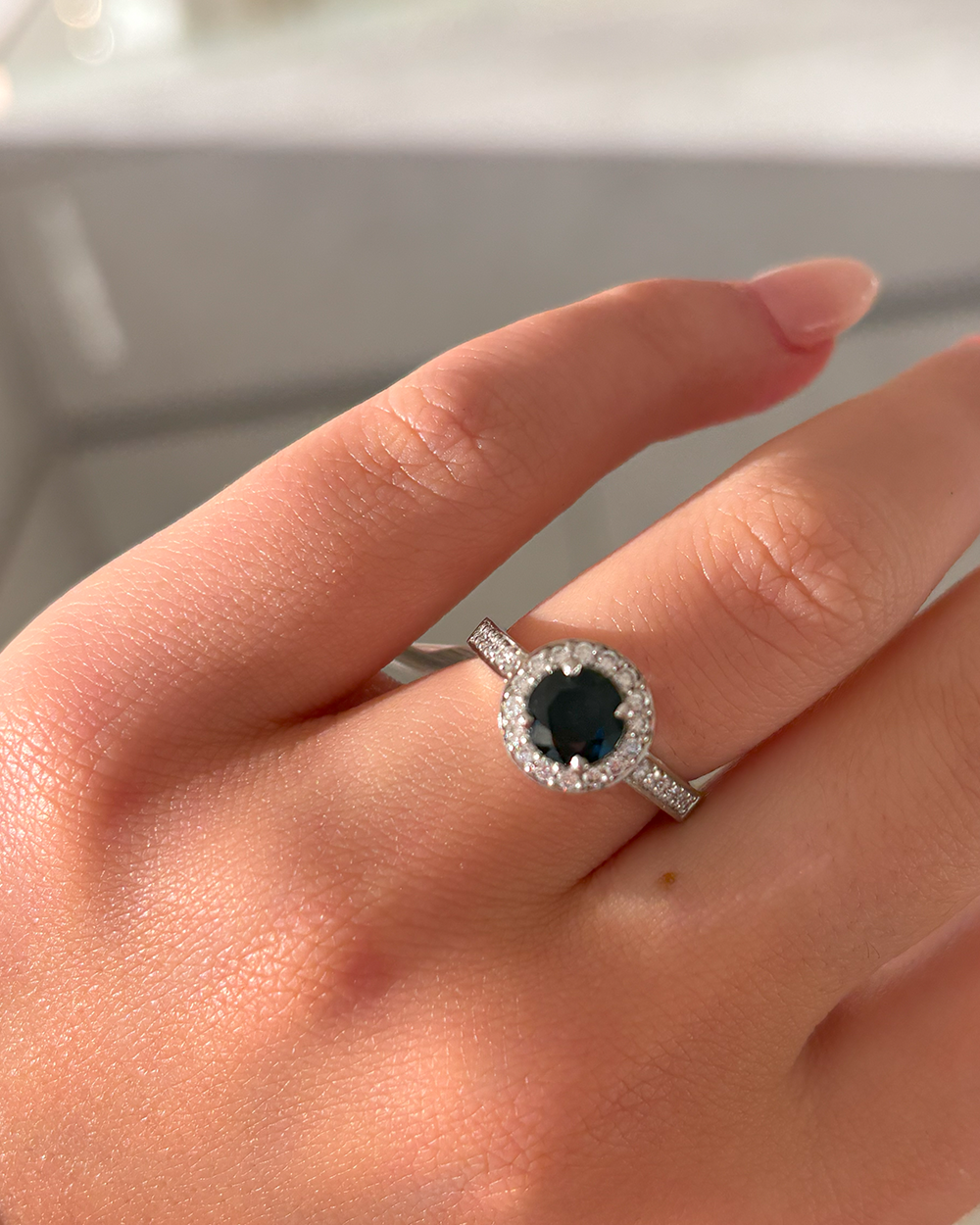 Brilliant Sapphire and Diamond Halo Ring