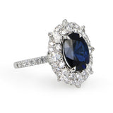 Nigerian Sapphire & Diamond Halo Ring