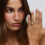 Evelyn ring profile showing flush fit against finger with pale pink manicure