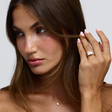 Nova 2.54ct Toi et Moi engagement ring with radiant and pear diamonds in 18ct yellow gold on hand