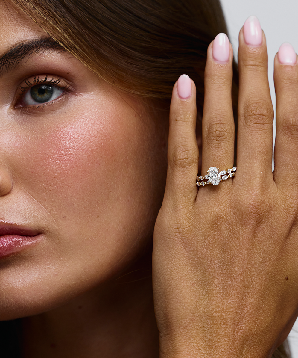 Kaylee oval diamond engagement ring side profile showing claw set band detail