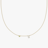 Solid gold personalised charm necklace with green birthstone and diamond 'S' initial