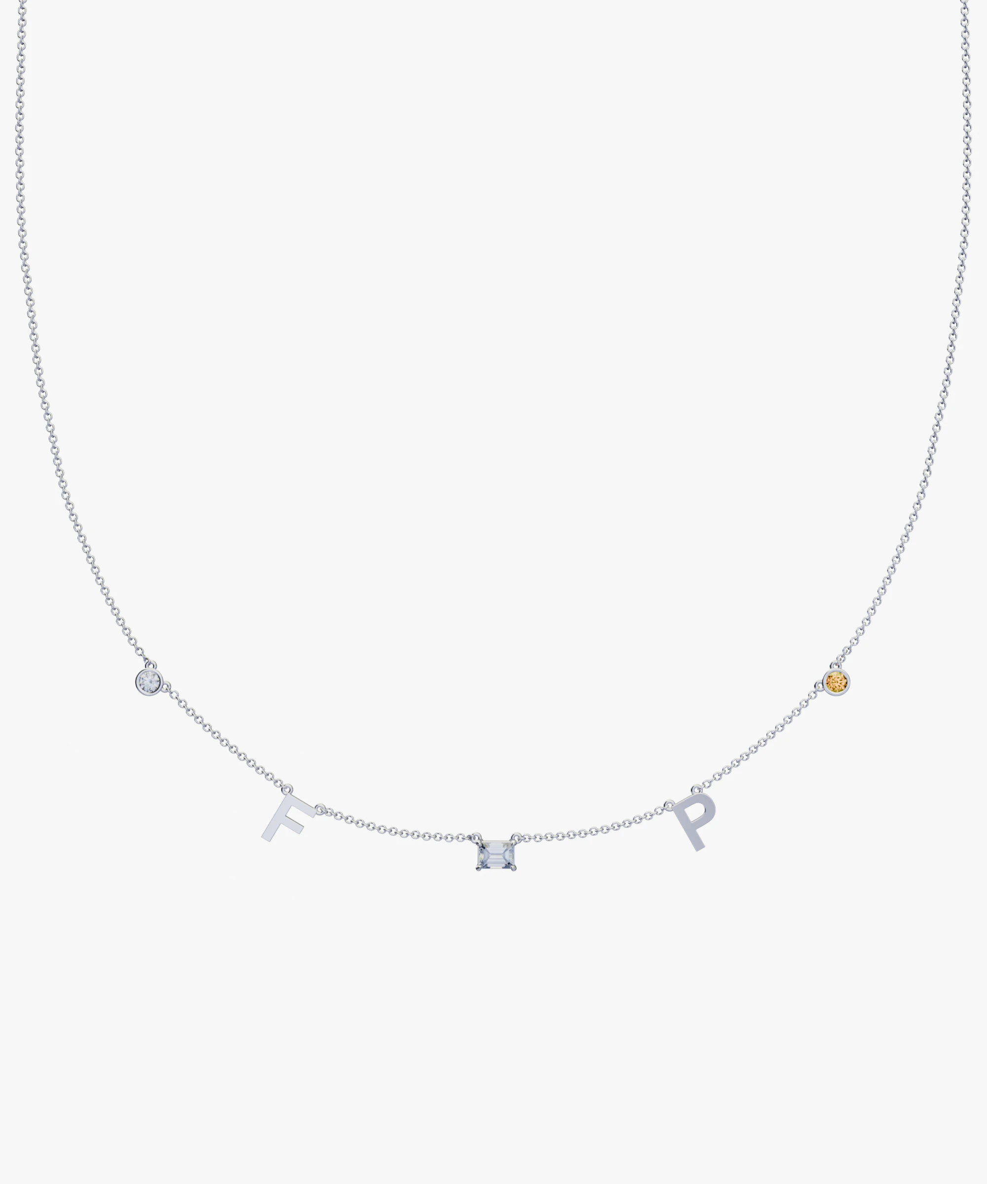 Personalised Charm Necklace with silver ball chain, letter F and P charms, blue gemstone, and yellow gold stone