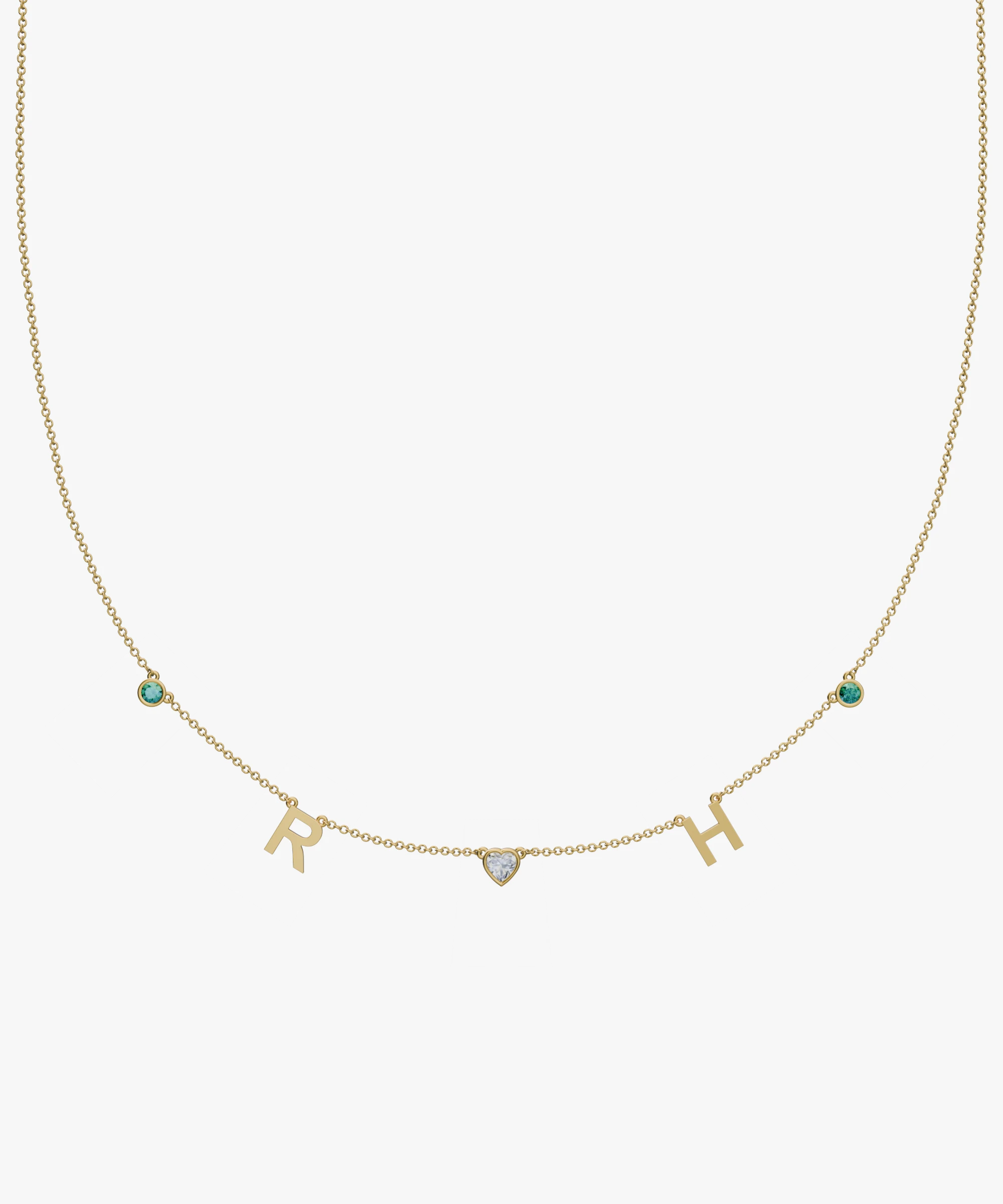 Yellow gold charm necklace with letter R and H initials, heart stone, and teal birthstone gems