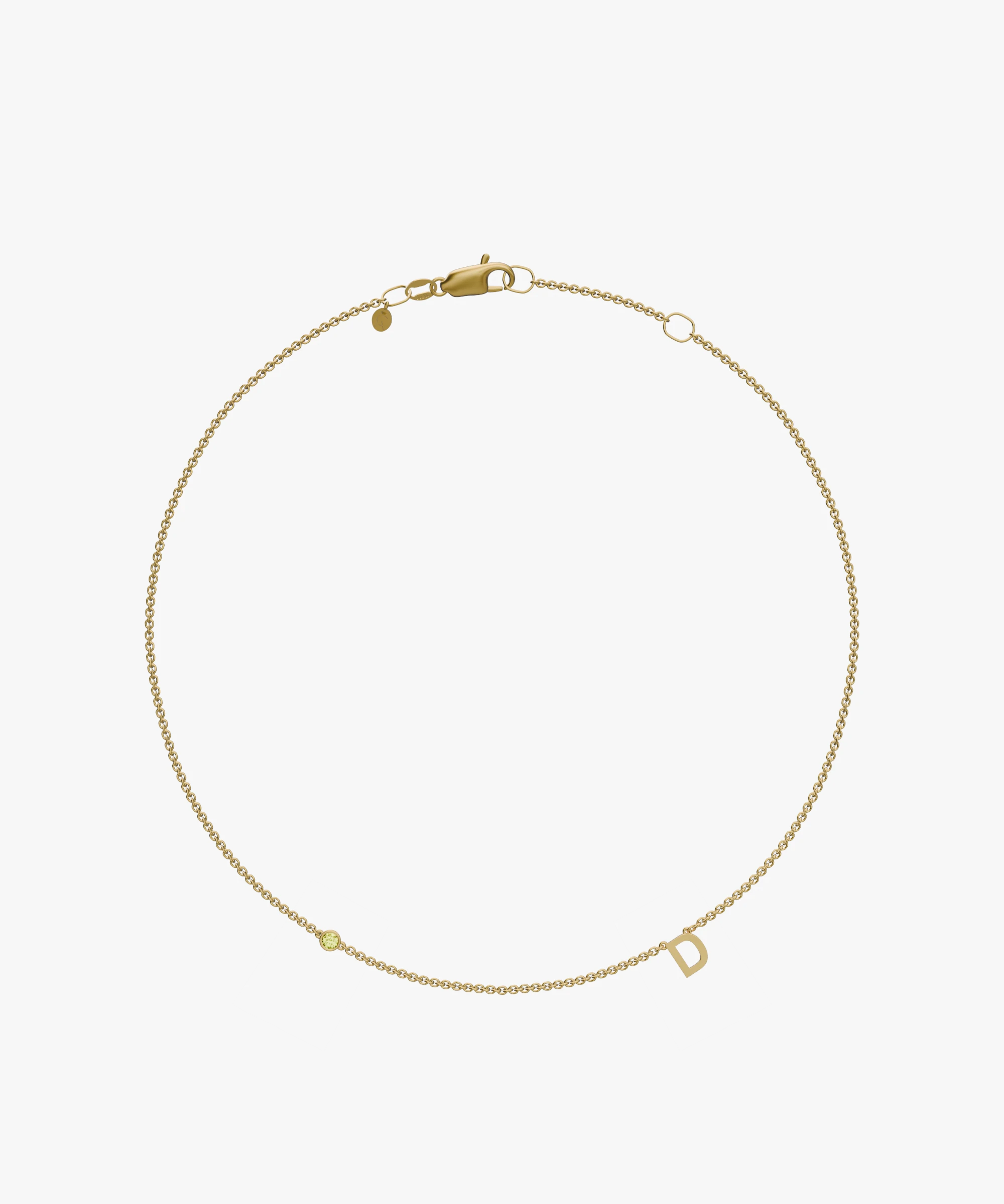 Yellow gold charm bracelet with birthstone and letter D initial