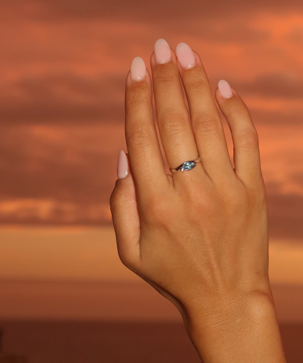 Oval Topaz & Diamond Bezel Ring