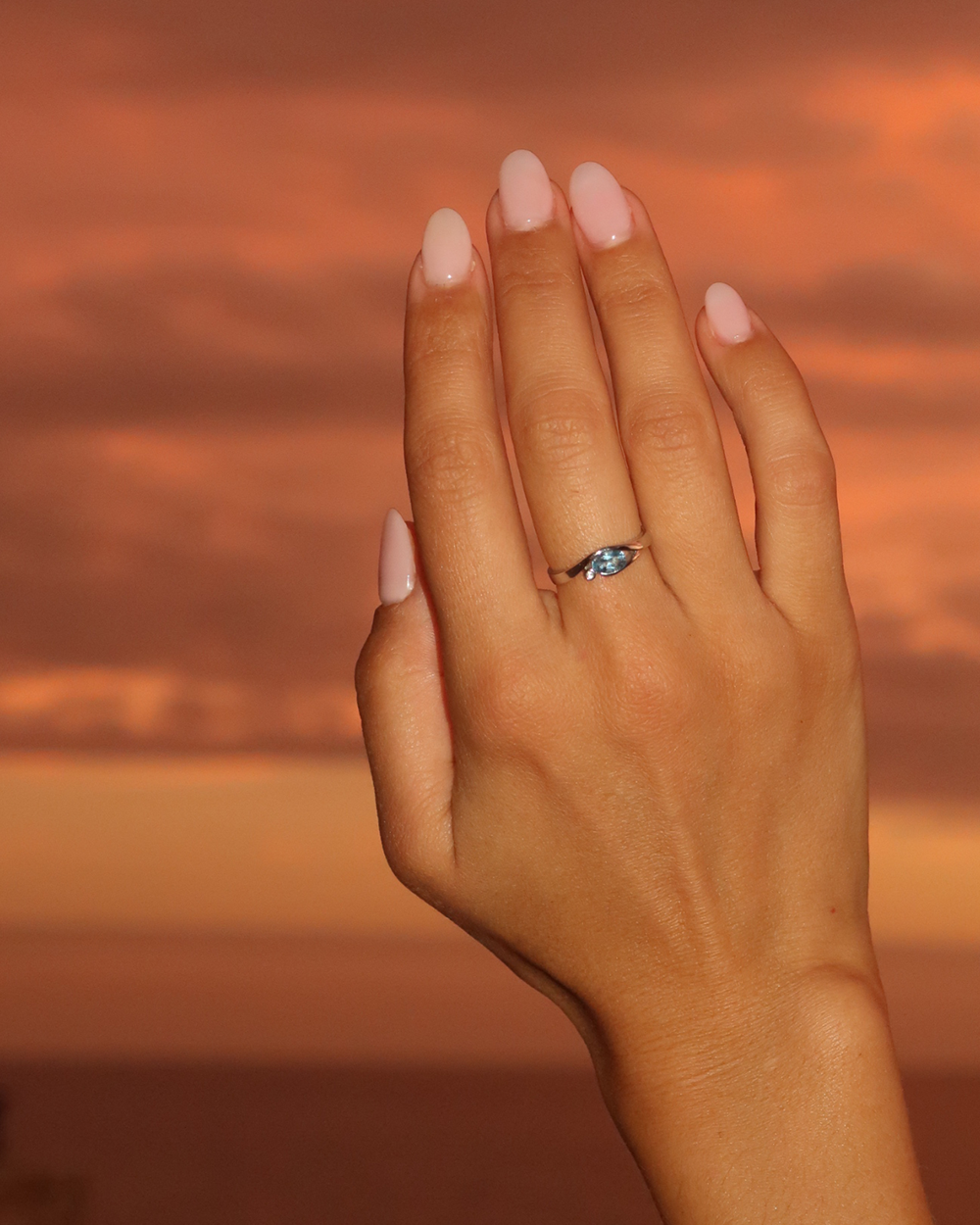 Oval Topaz & Diamond Bezel Ring