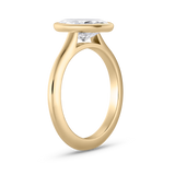 Side profile of high-profile marquise diamond ring in tapered 18ct yellow gold shank