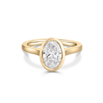 Isolated 18ct yellow gold oval diamond bezel engagement ring with smooth tapered band
