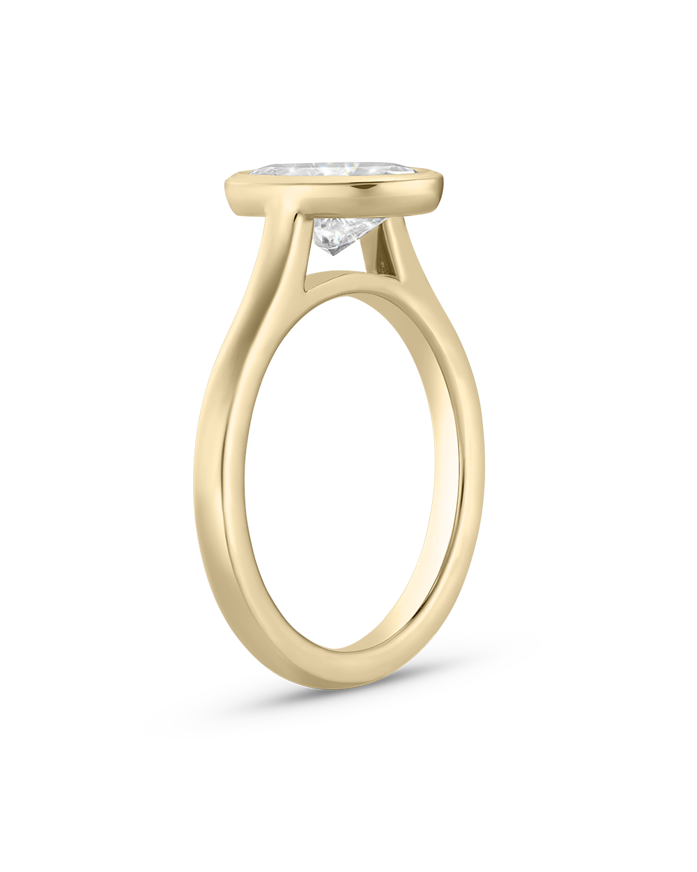 Side profile of 18ct yellow gold oval diamond bezel setting showing modern floating silhouette