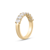 Side view of 18ct yellow gold cushion cut diamond band with channel setting