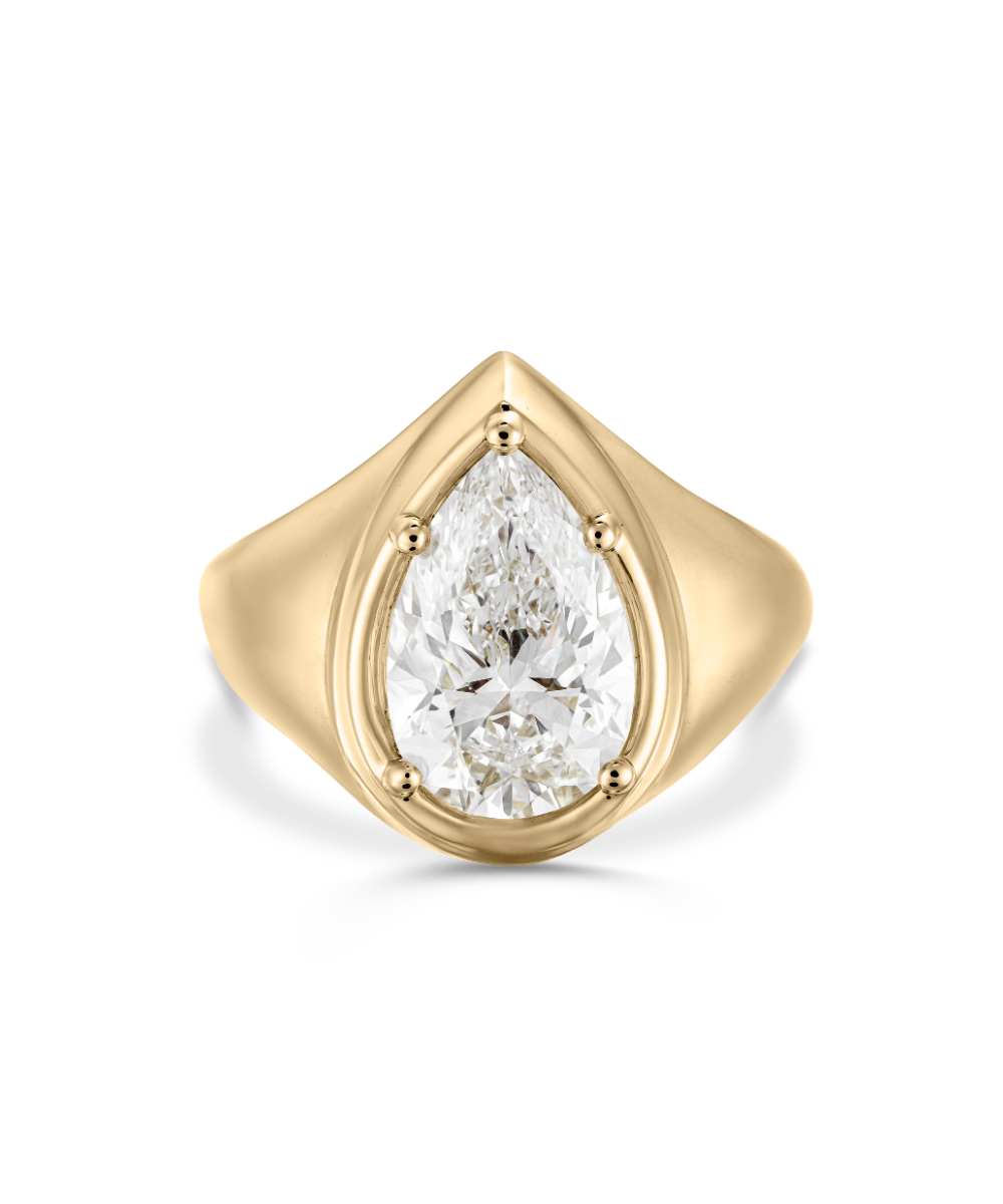 Front view of Claudette pear diamond signet ring in hybrid bezel-claw setting