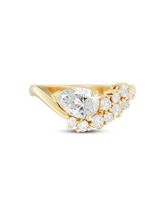 Front view of pear cut lab grown diamond engagement ring with floral cluster halo in yellow gold