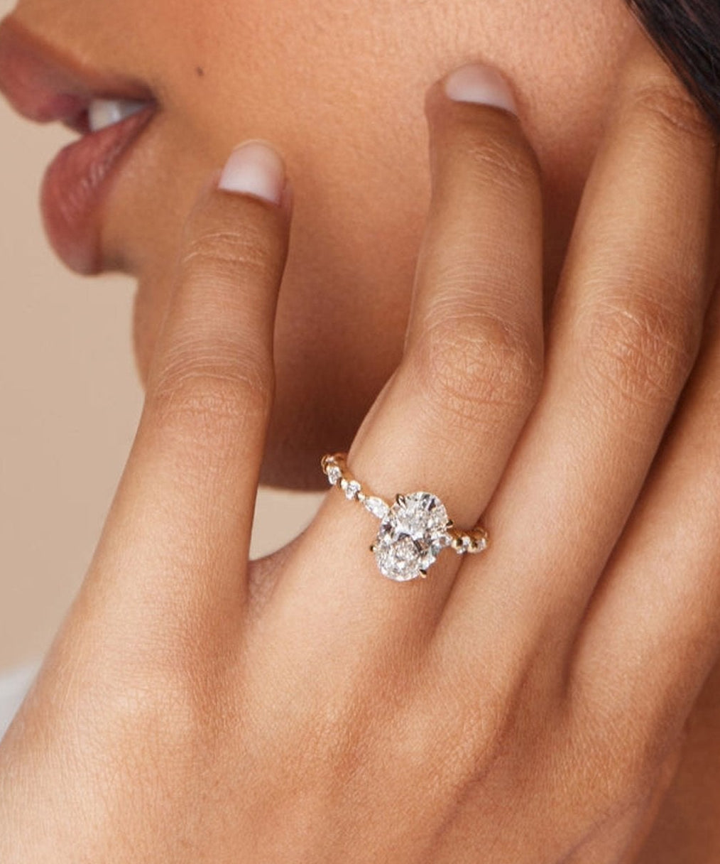 18ct White Gold Oval Diamond Engagement Ring on Hand Showing Fit and Sparkle