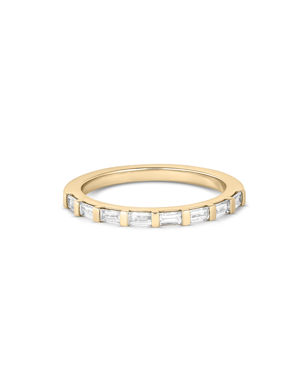 Top-down detail of eight baguette cut lab grown diamonds in yellow gold claw setting
