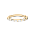 Top-down detail of eight baguette cut lab grown diamonds in yellow gold claw setting
