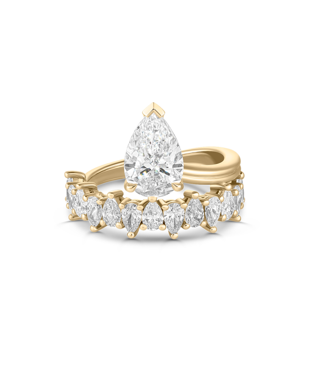 Side profile view of 18ct yellow gold pear diamond engagement ring band
