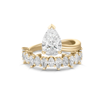 Side profile view of 18ct yellow gold pear diamond engagement ring band
