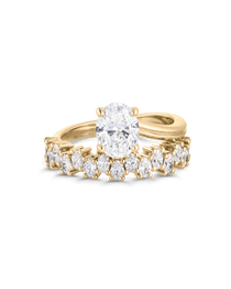 Top-down view of 18ct yellow gold oval diamond ring with separate bezel-set 15-stone band