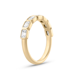 Nina East-West Emerald Bezel Diamond Ring in 18ct yellow gold with seven emerald cut diamonds