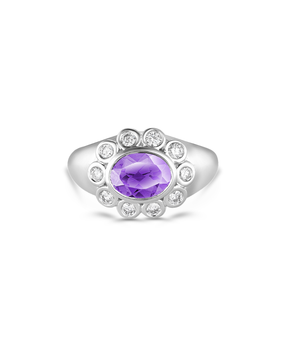 Front view of Ophelia Pinky Ring in white gold featuring oval amethyst birthstone surrounded by diamond halo