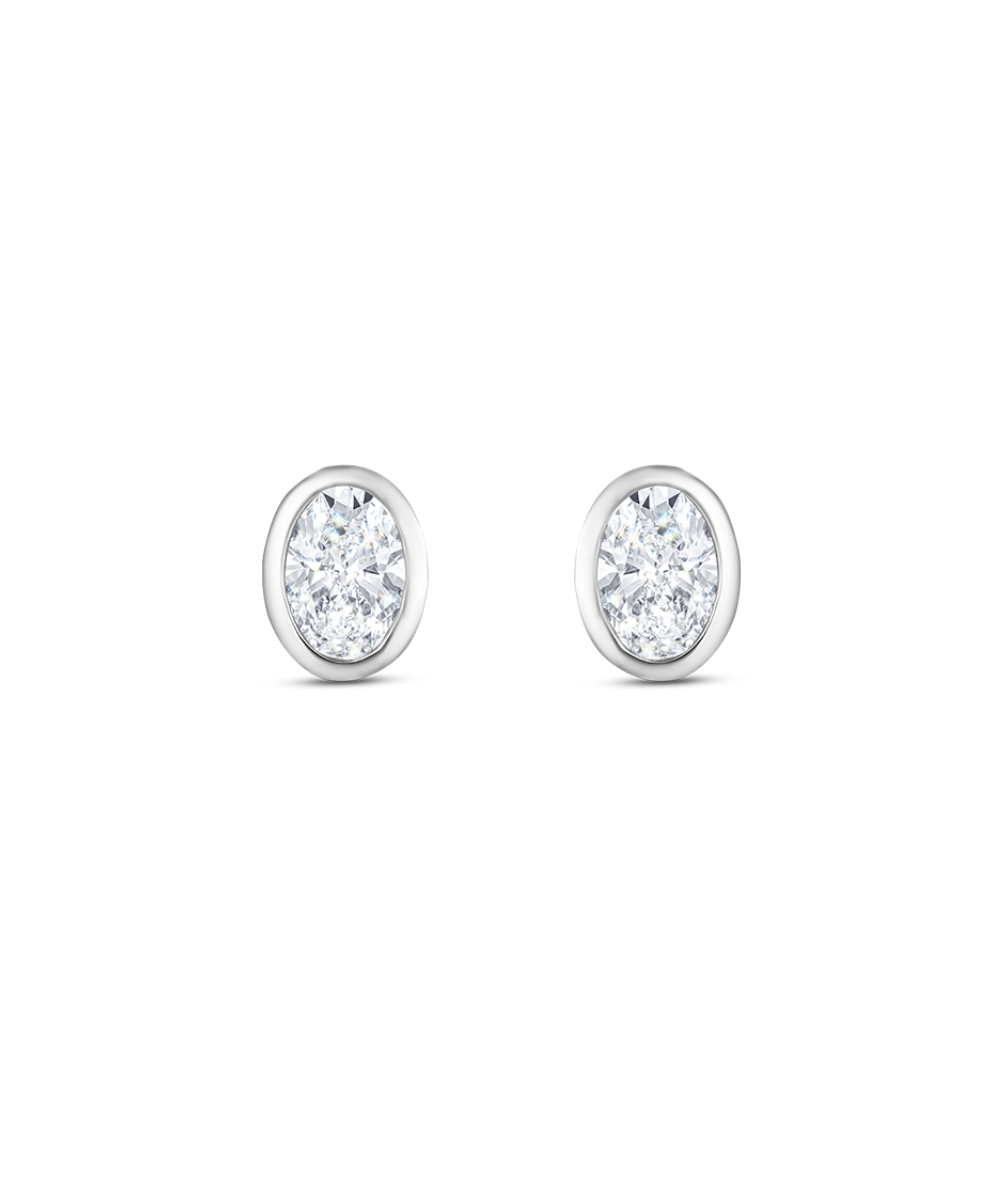 Pair of white gold oval diamond stud earrings front view