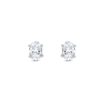 White gold oval diamond stud earrings with four claw setting