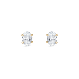 Pair of yellow gold oval diamond stud earrings side-by-side
