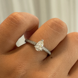 Pear 0.7ct Solitaire Diamond with Channel Set Diamond Band