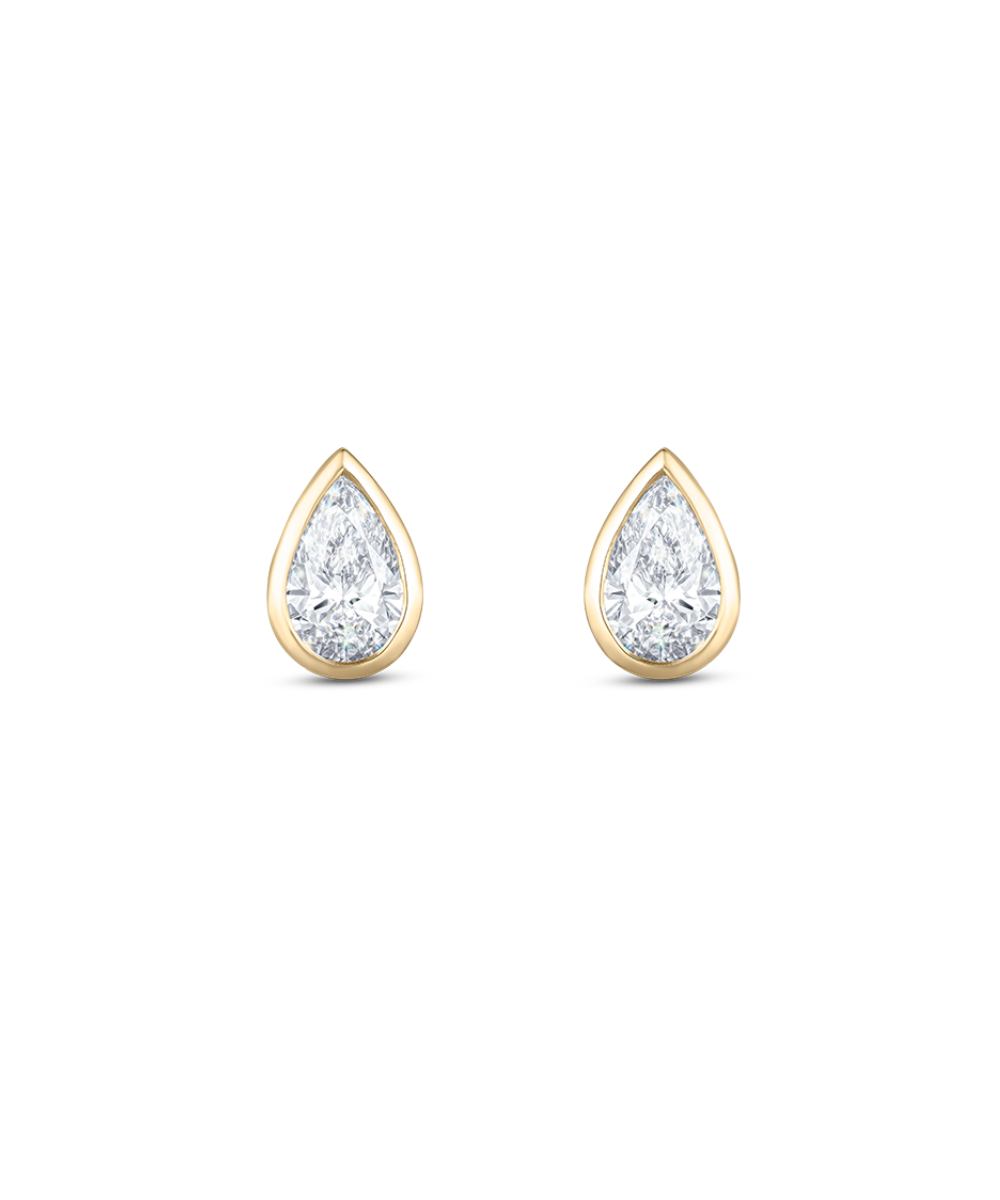 Yellow gold pear diamond stud earrings with bezel setting