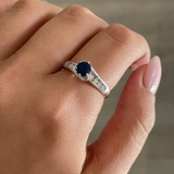 Round Sapphire Ring with Channel Set Diamond Band