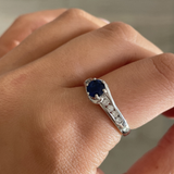 Round Sapphire Ring with Channel Set Diamond Band