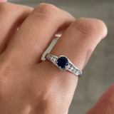 Round Sapphire Ring with Channel Set Diamond Band