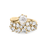 Isolated studio shot of 18ct yellow gold Sana Diamond Ring with pear accents