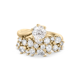 Isolated studio shot of 18ct yellow gold Sana Diamond Ring with pear accents