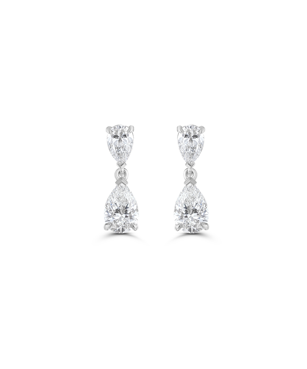 White gold pair of pear shaped diamond drop earrings