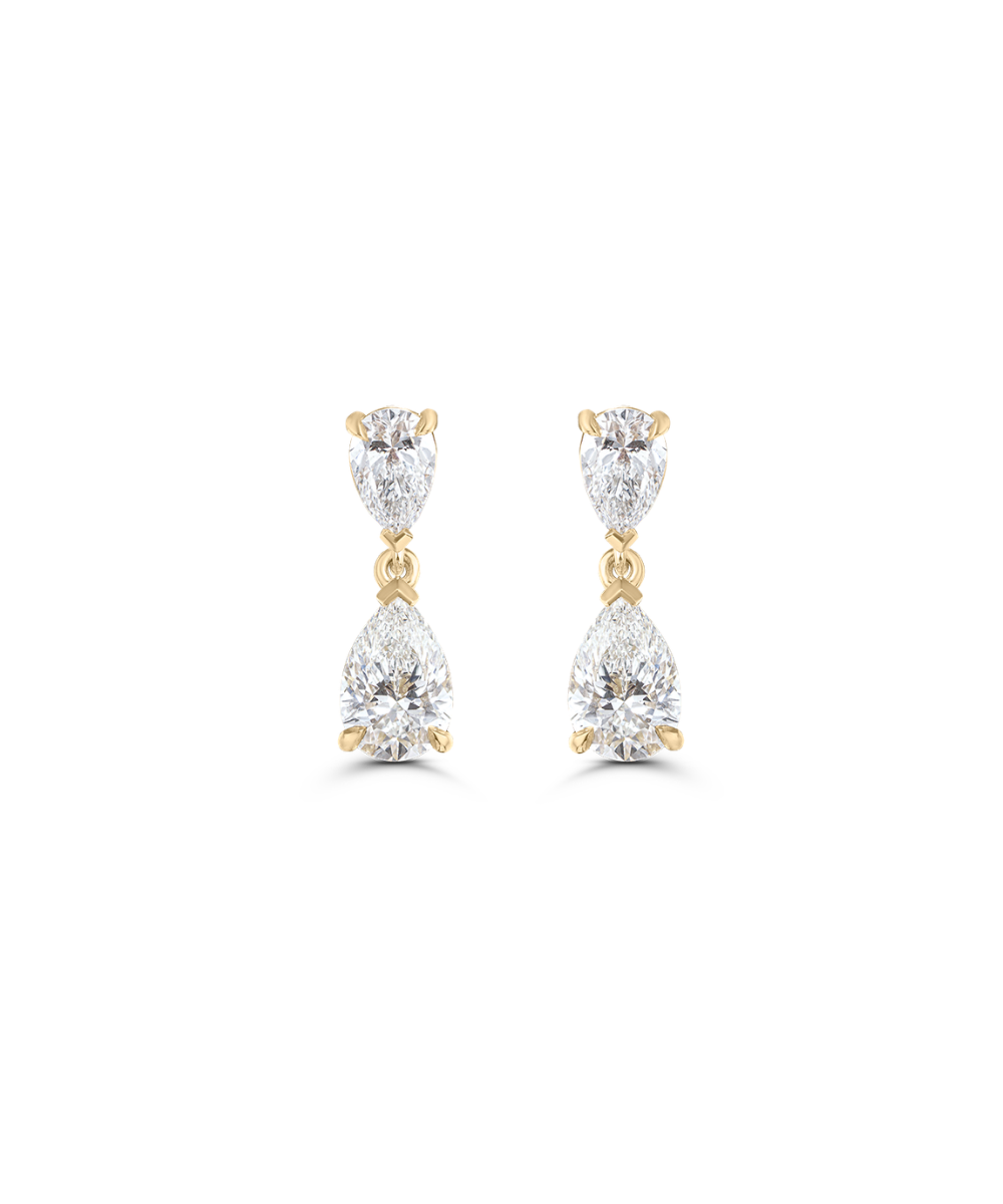 Yellow gold pair of pear cut diamond drop earrings