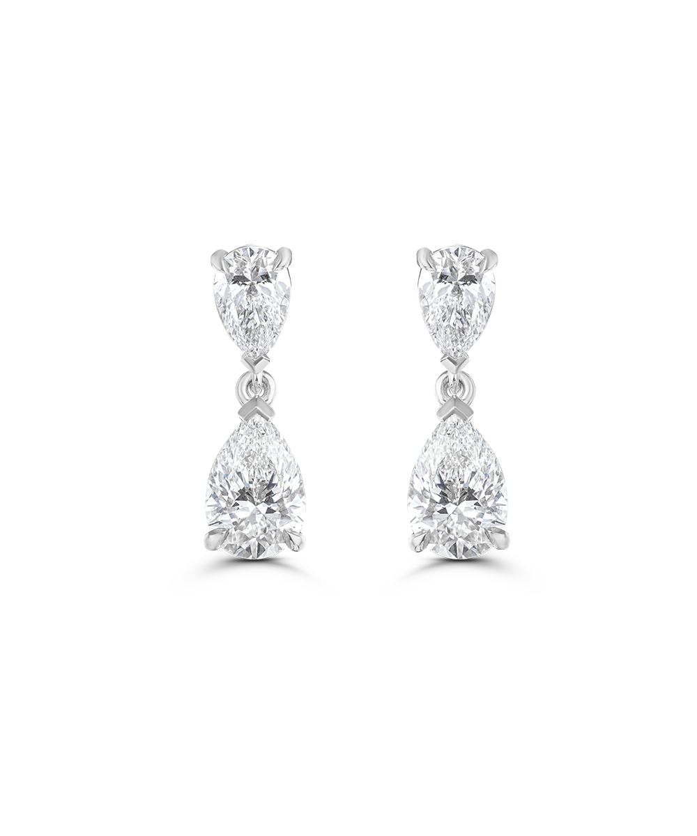 White gold large pear diamond drop earrings with four-prong claw settings