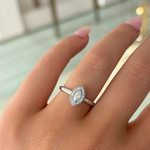 Marquise and Diamond Halo Ring