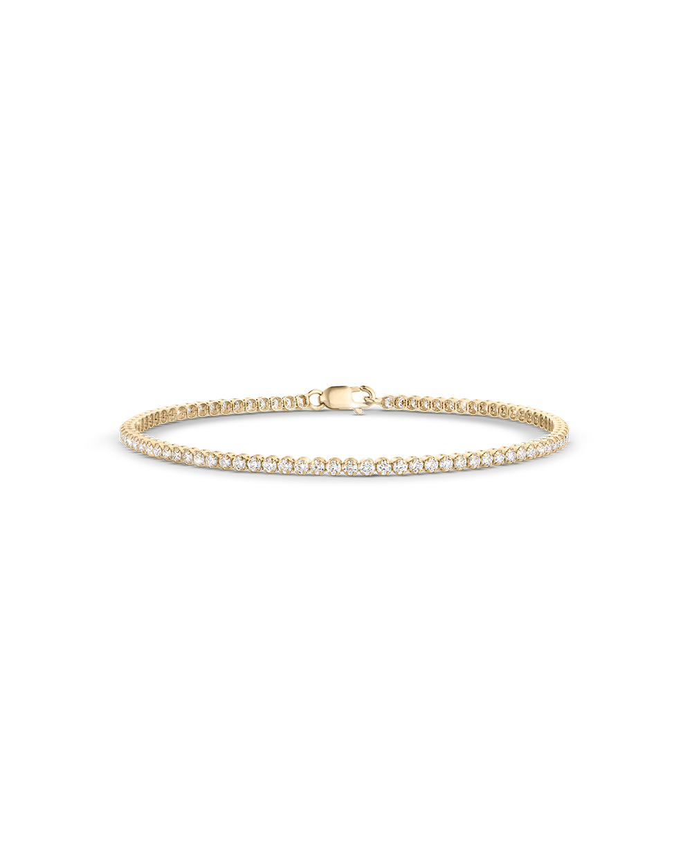 Horizontal studio shot of yellow gold mini tennis bracelet with central clasp