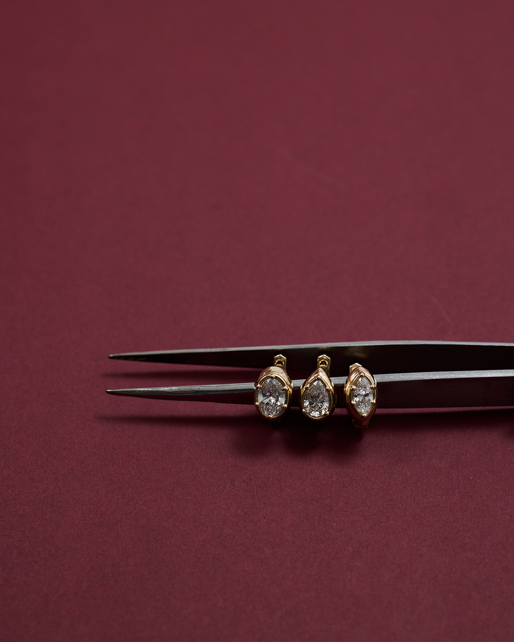 Cleo Pear Diamond Huggies Earrings