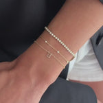 Swipe for wrist stack inspo, starting with one for the white gold girlies 🤍 

Pictured from top to bottom:
1. Phia Bangle 
2. 4.74 Tennis Bracelet 
3. Personalised Charm Bracelet 

A diamond multicut moment

Pictured from left to right:
1. Multicut Diamond Charm Bracelet 
2. Base Chain
3. Multicut Bezel Tennis Bracelet 

A subtle diamond stack 

Pictured from top to bottom:
1. Petite Tennis Bracelet 
2. Stardust Bracelet 
3. Initial Bracelet 

The staple, everyday day stack 

Pictured from left to right: 
